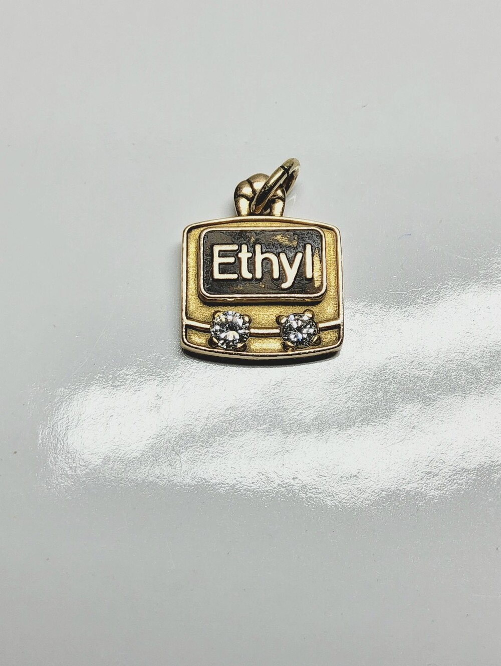 Vintage 10K Solid Yellow Gold And Natural Diamond Ethyl Corp. Pendant Charm